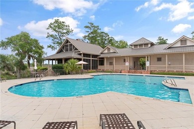 This .63-acre residential lot is situated behind the gates of - photo 3