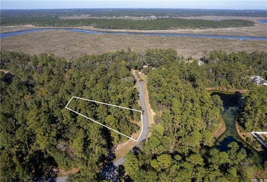 This .63-acre residential lot is situated behind the gates of - photo 5