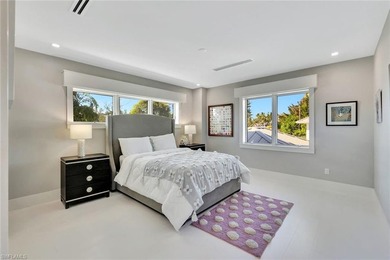 This 2022 custom-built home in Old Naples offers the perfect - photo 31