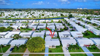 Welcome to this charming single-story home in Palm Beach - photo 3