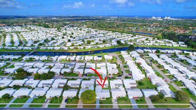 Welcome to this charming single-story home in Palm Beach - photo 4