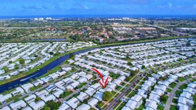 Welcome to this charming single-story home in Palm Beach - photo 10
