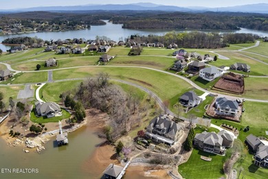 ONE OF THE LAST AVAILABLE gently-sloped LAKEFRONT LOTS left in