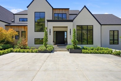 Make your way up a private lane to an exceptional modern estate - photo 7