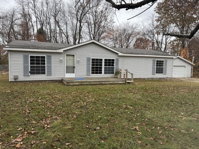 Indian Lake - Montcalm County Home For Sale in Howard City Michigan