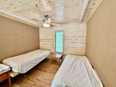 Surrounded by towering pines and overlooking a private pond - photo 16
