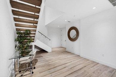 Experience refined townhouse-style living in the heart of - photo 21