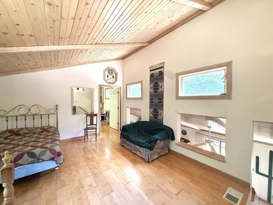 Surrounded by towering pines and overlooking a private pond - photo 23