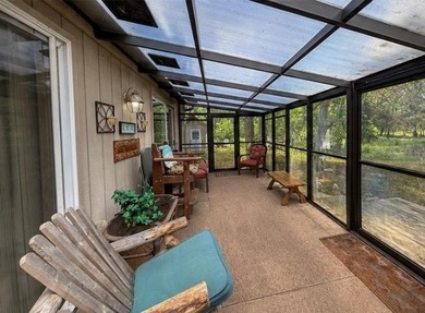 Surrounded by towering pines and overlooking a private pond - photo 29
