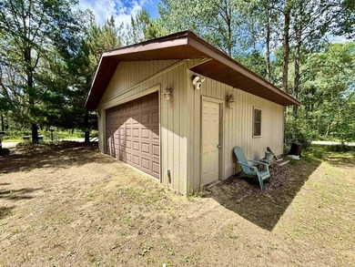 Surrounded by towering pines and overlooking a private pond - photo 35