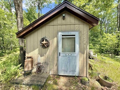 Surrounded by towering pines and overlooking a private pond - photo 38