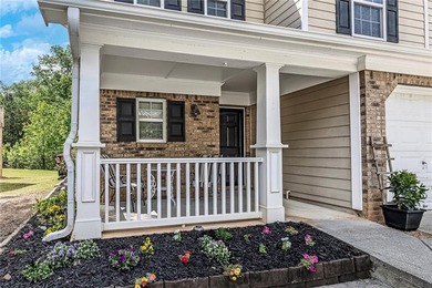 Located in Victoria Crossing, this end-unit townhome offers - photo 4