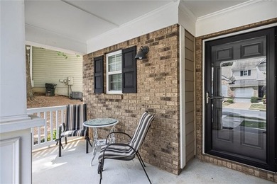 Located in Victoria Crossing, this end-unit townhome offers - photo 5