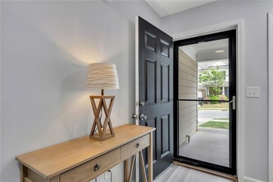 Located in Victoria Crossing, this end-unit townhome offers - photo 6
