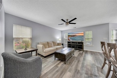 Located in Victoria Crossing, this end-unit townhome offers - photo 7