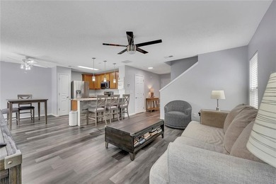 Located in Victoria Crossing, this end-unit townhome offers - photo 9