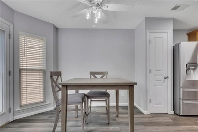 Located in Victoria Crossing, this end-unit townhome offers - photo 10