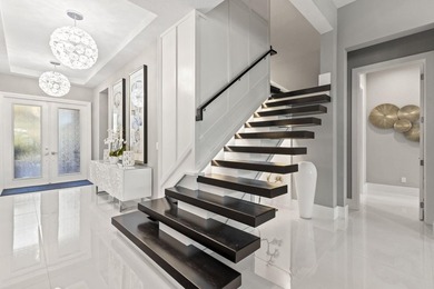 Stunning 4-bedroom, 5-bathroom lakefront estate home in - photo 8
