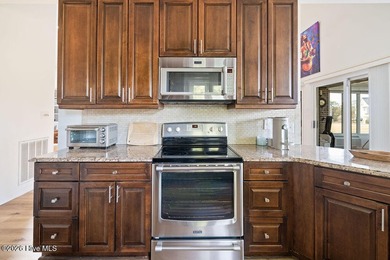 This 3-bedroom, 2-bath brick home is perfectly positioned beside - photo 8
