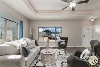 Bright, open & impeccably maintained! The upscale living room