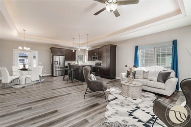 Bright, open & impeccably maintained! The upscale living room