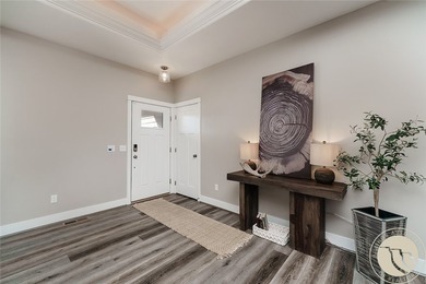 Bright, open & impeccably maintained! The upscale living room