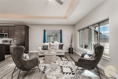 Bright, open & impeccably maintained! The upscale living room