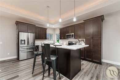 Bright, open & impeccably maintained! The upscale living room