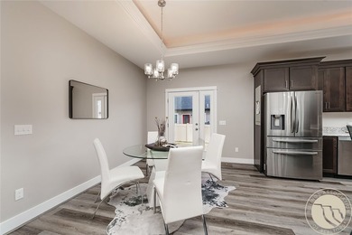 Bright, open & impeccably maintained! The upscale living room