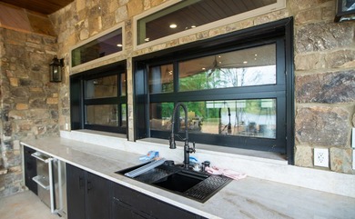 Still Mac Farm is a custom barndominium estate on 97 +/- acres - photo 11