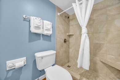 Located on the pristine sands of Litchfield Beach, this charming - photo 12
