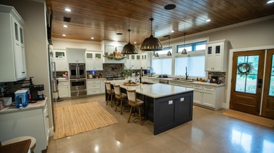Still Mac Farm is a custom barndominium estate on 97 +/- acres - photo 14
