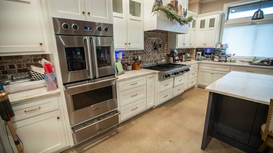 Still Mac Farm is a custom barndominium estate on 97 +/- acres - photo 17