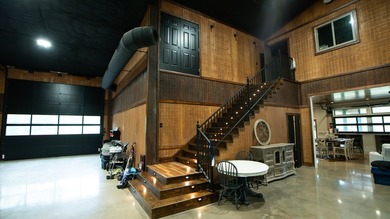 Still Mac Farm is a custom barndominium estate on 97 +/- acres - photo 32