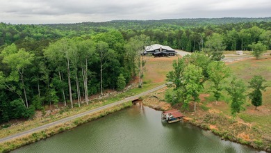 Still Mac Farm is a custom barndominium estate on 97 +/- acres - photo 41