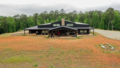Still Mac Farm is a custom barndominium estate on 97 +/- acres - photo 43