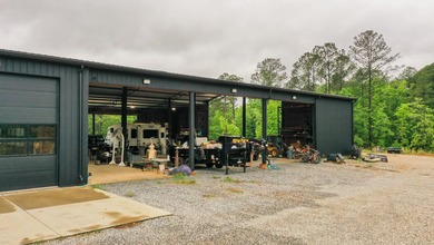 Still Mac Farm is a custom barndominium estate on 97 +/- acres - photo 46