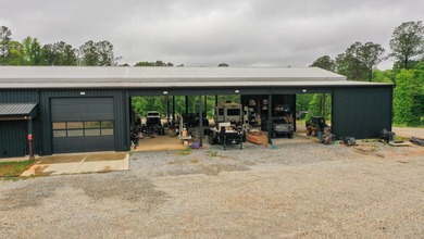 Still Mac Farm is a custom barndominium estate on 97 +/- acres - photo 47