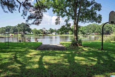 Escape to lake living with this charming waterfront home on - photo 11