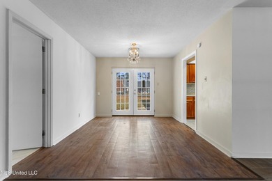 This well-maintained 4-bedroom, 2-bath brick home is situated on - photo 12