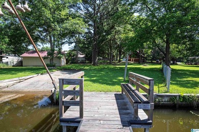 Escape to lake living with this charming waterfront home on - photo 13