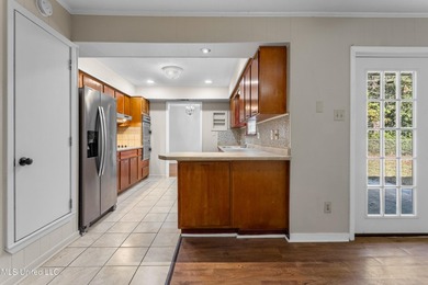 This well-maintained 4-bedroom, 2-bath brick home is situated on - photo 14