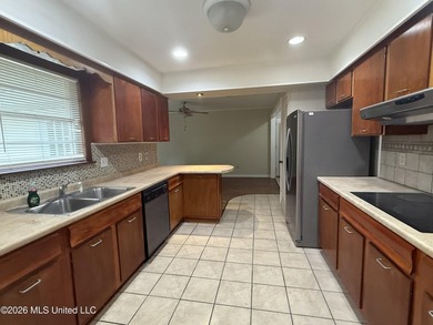 This well-maintained 4-bedroom, 2-bath brick home is situated on - photo 15