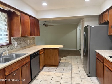 This well-maintained 4-bedroom, 2-bath brick home is situated on - photo 16