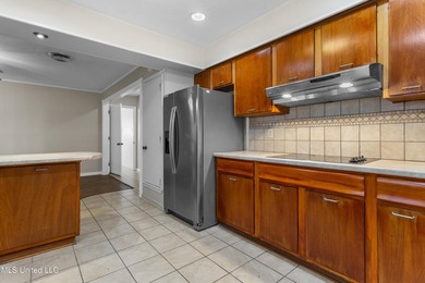 This well-maintained 4-bedroom, 2-bath brick home is situated on - photo 18