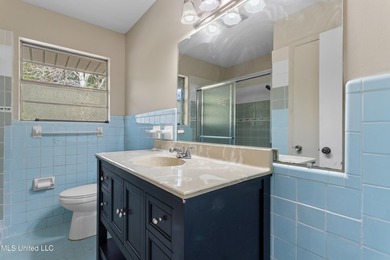 This well-maintained 4-bedroom, 2-bath brick home is situated on - photo 25
