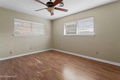 This well-maintained 4-bedroom, 2-bath brick home is situated on - photo 26