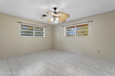 This well-maintained 4-bedroom, 2-bath brick home is situated on - photo 28