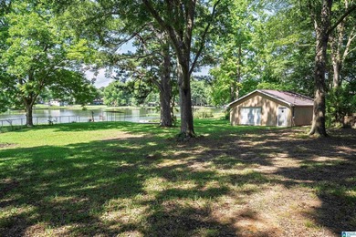 Escape to lake living with this charming waterfront home on - photo 42