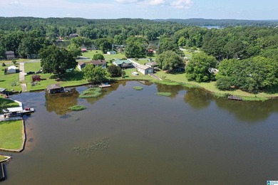 Escape to lake living with this charming waterfront home on - photo 47